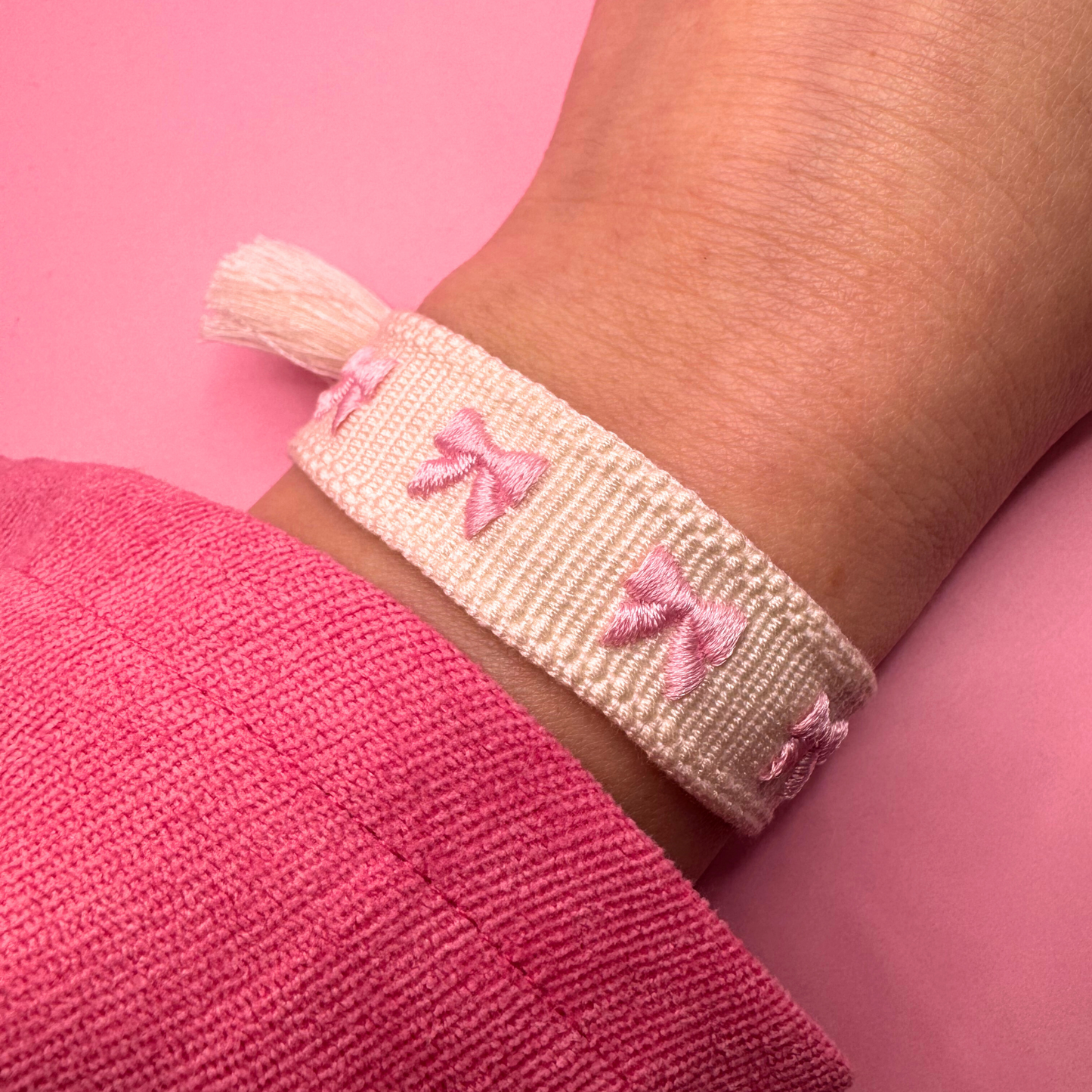 PINK BOW TASSEL BRACELET
