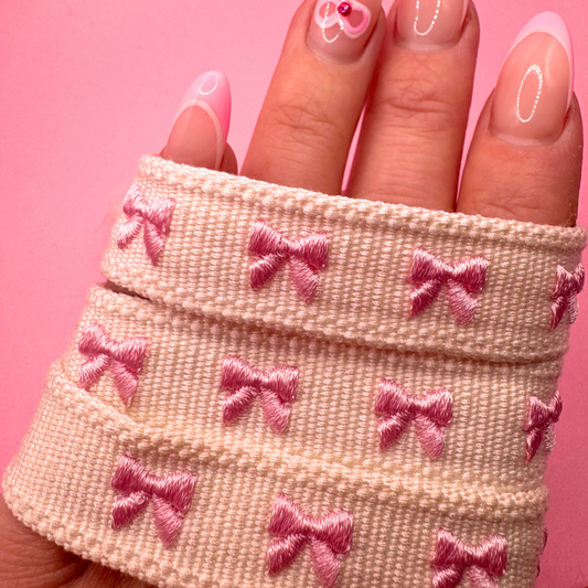 PINK BOW TASSEL BRACELET